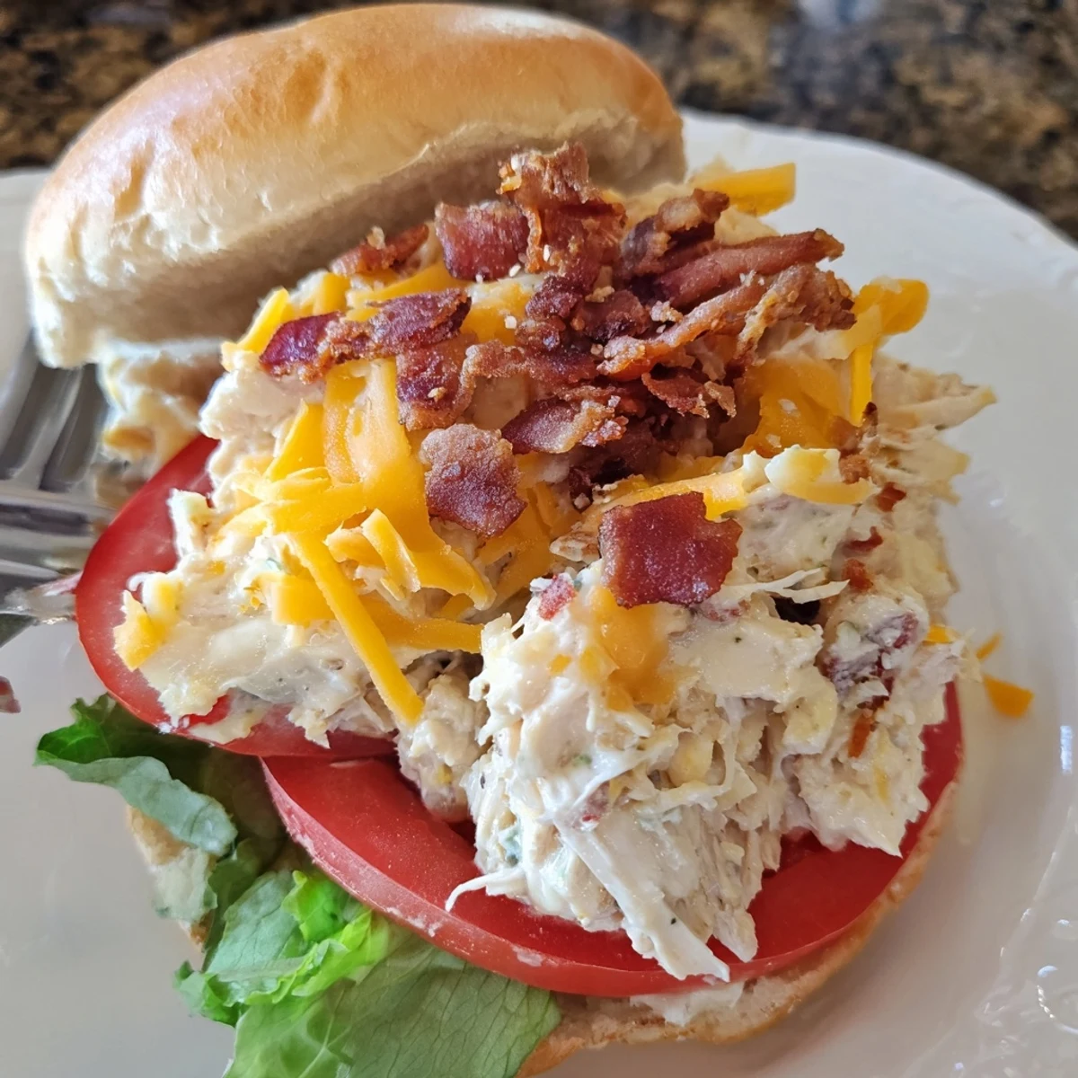 Warm Crack Chicken Sandwiches mounded on brioche, creamy ranch aroma wafting