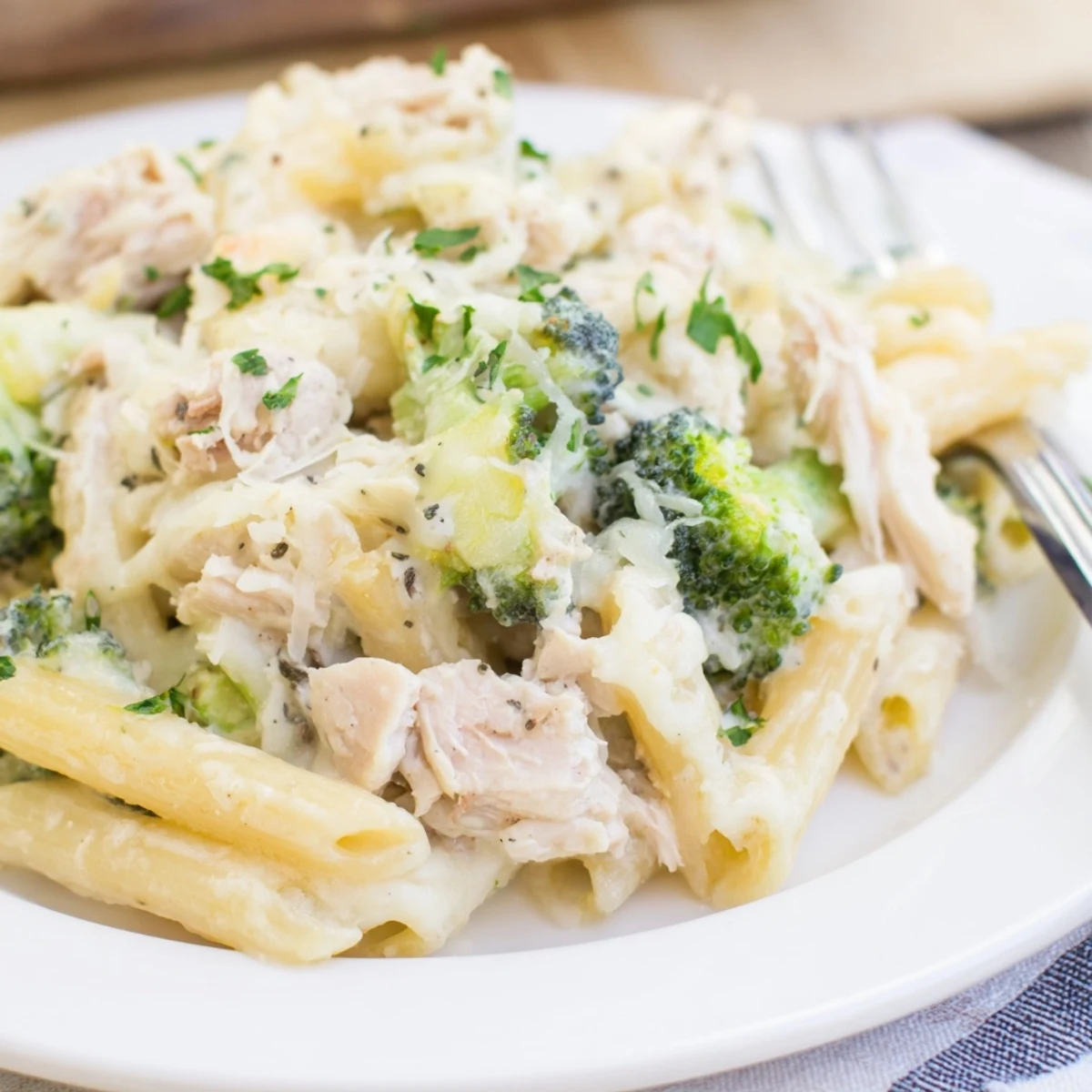 Weeknight Chicken Broccoli Alfredo Bake Recipe with tender chicken, bright broccoli, melted mozzarella