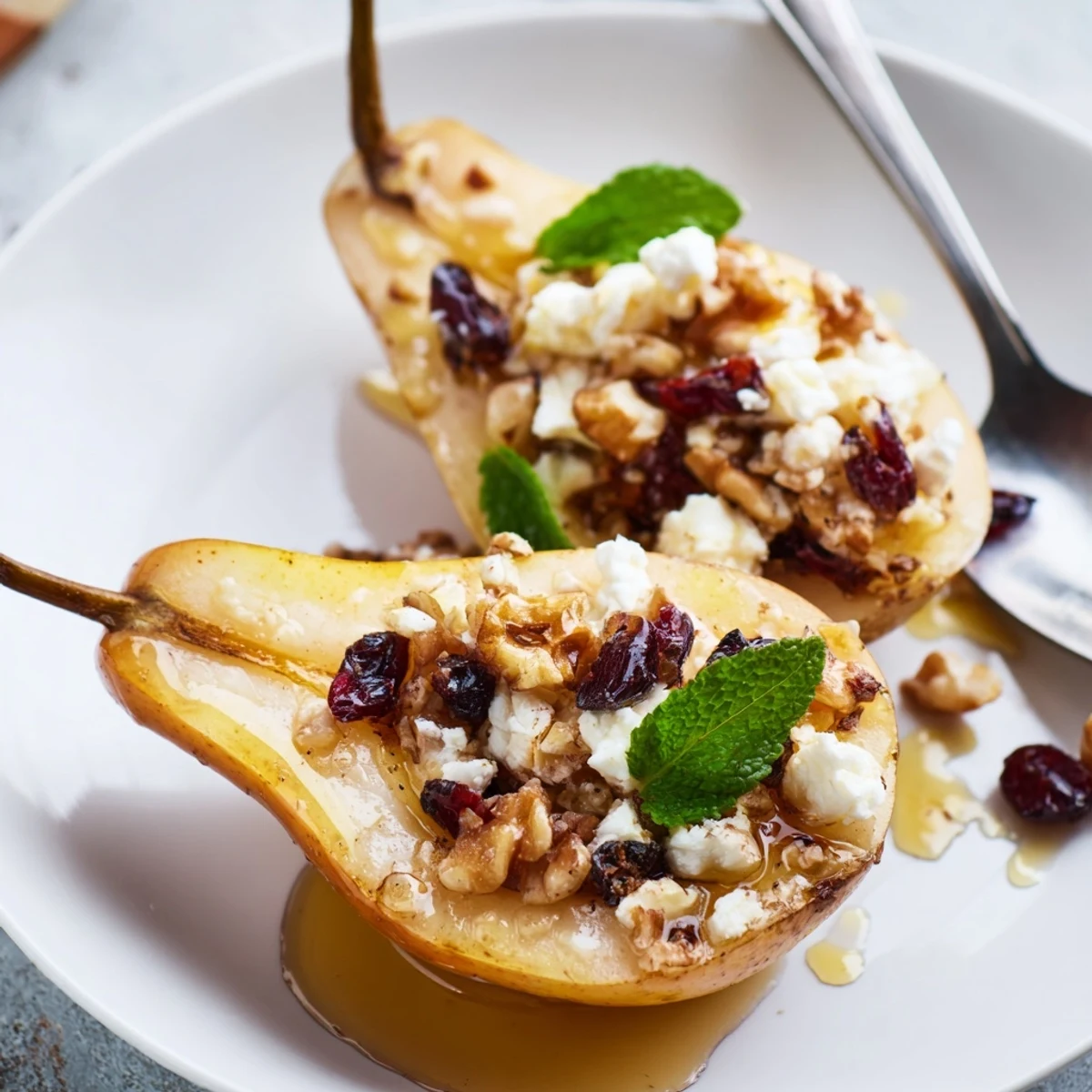 Oven roasted Baked Pears With Feta Honey Cranberries, soft centers and walnut crunch
